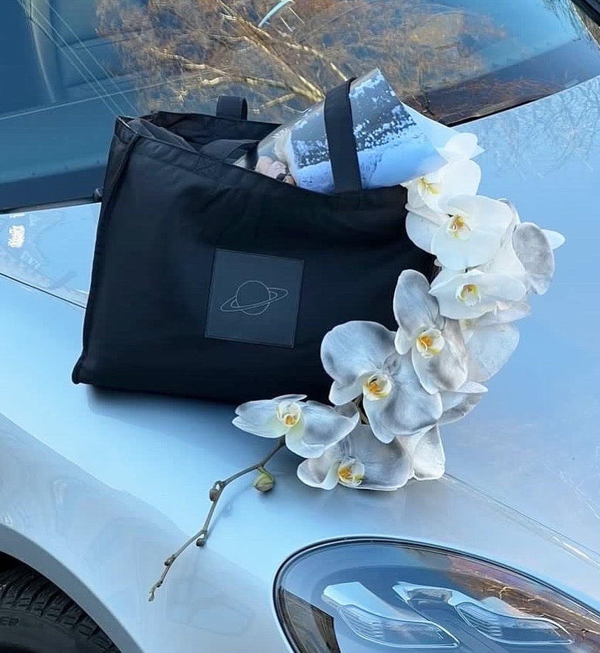 Orchids arranged for Nusa Planet, featuring elegant blooms in a modern and minimal display.